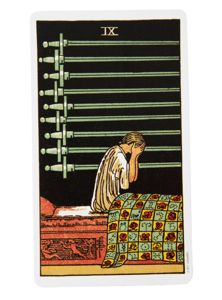 Nine of swords artwork, deemed the worst tarot card for anxiety, featuring a figure sitting in bed with head in hands, weighed down by troubling thoughts.